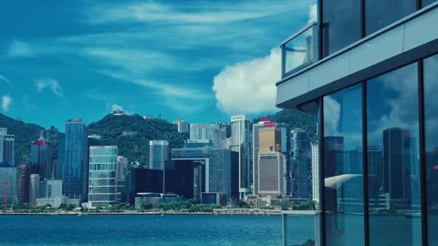 A panoramic view from above showcasing an urban skyline dominated by towering Stock Footage 338310989