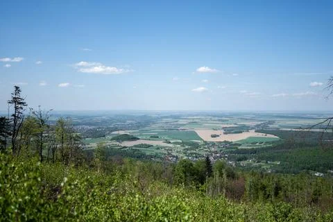 Panoramic view from above of a vast valley with fields forests Foto stock