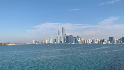Panoramic view of Abu Dhabi city skyline. Flying seagulls. Abu Dhabi, UAE Stock Footage 298901987