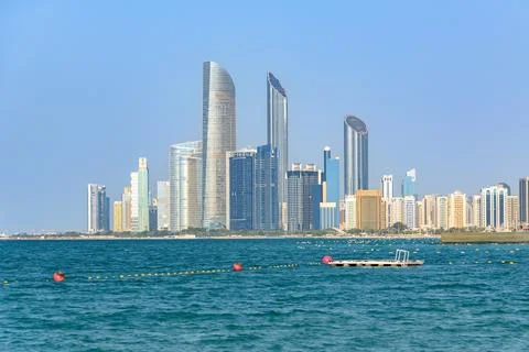 Panoramic view of Abu Dhabi Corniche skyline and turquoise sea Stock Photos