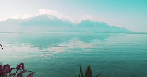 Panoramic View Across Lake Geneva Towards the Swiss Alps Stock Footage 337434670