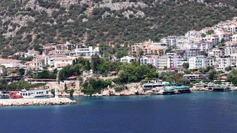 Panoramic view, aerial skyline of small harbor village of Kas with tiny beach Stock Footage 317699689