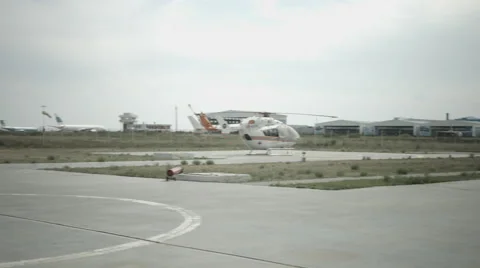 Panoramic view of airstrip and helicoptor Stock Footage 59558355