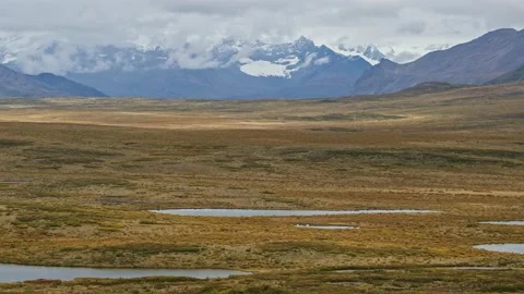 Panoramic view of Alaska Range and McClaren Glacier in Alaska. Video stock 153160989