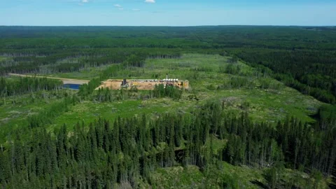 Panoramic View of Alberta Boreal Forest and Drilling Rig Stockbeeldmateriaal 340859914
