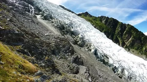 Panoramic view of alpine glacier in Chamonix with mountain meadow Stock Footage 52718184