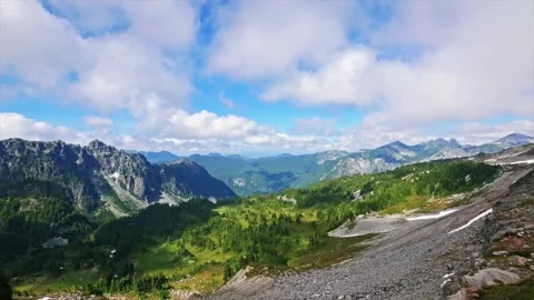 Panoramic View of Alpine Mountains and Green Valleys along the Spray Park Trail, Video stock 332083039