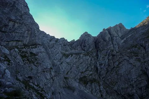A panoramic view on Alpine slopes in Austria with sharp ans steep mountains Stock Photos