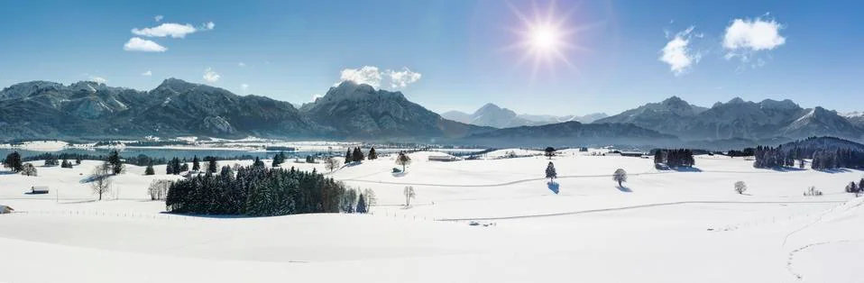 Panoramic view to alps mountain range in Bavaria at winter Stock Photos
