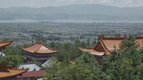 Panoramic View of Ancient Asian Buddhist Temple Complex on Mountain Peak Stock Footage 346248641