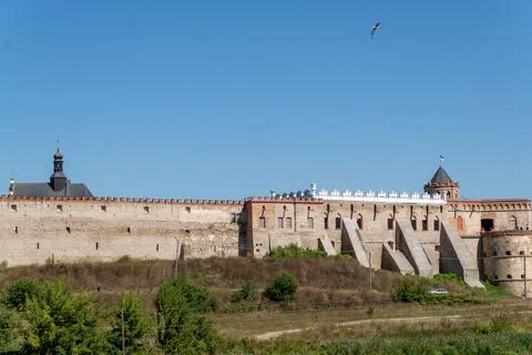 Panoramic view of ancient medieval castle with long fortification stone walls Fotos Stock