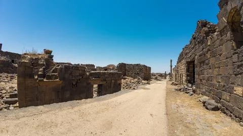 Panoramic view of ancient ruins under clear blue sky Stock Photos
