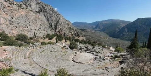 Panoramic view of Ancient theater in Delphi, Greece in a summer day Stock Photos