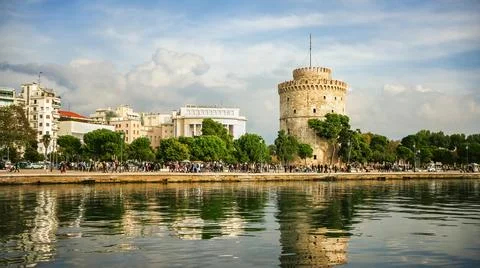 Panoramic view and reflection of White Tower in Thessaloniki or Saloniki capital Stock Photos