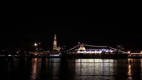 Panoramic view of Antwerp cityscape over Scheldt river at a full moon Stock Footage 99431164