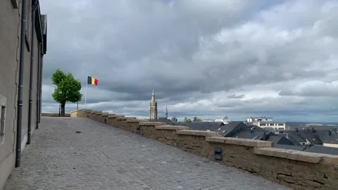 Panoramic view of Arlon city rooftops. St Martin church. Belgian flag. Belgium Stock Footage 307496053