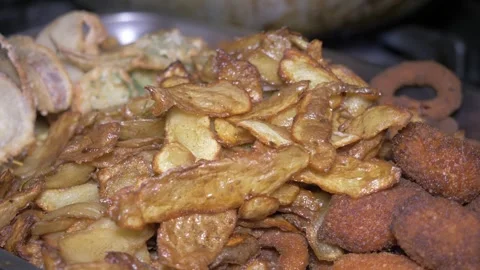 Panoramic view of assorted fried appetizers ready for serving 動画素材 336793415