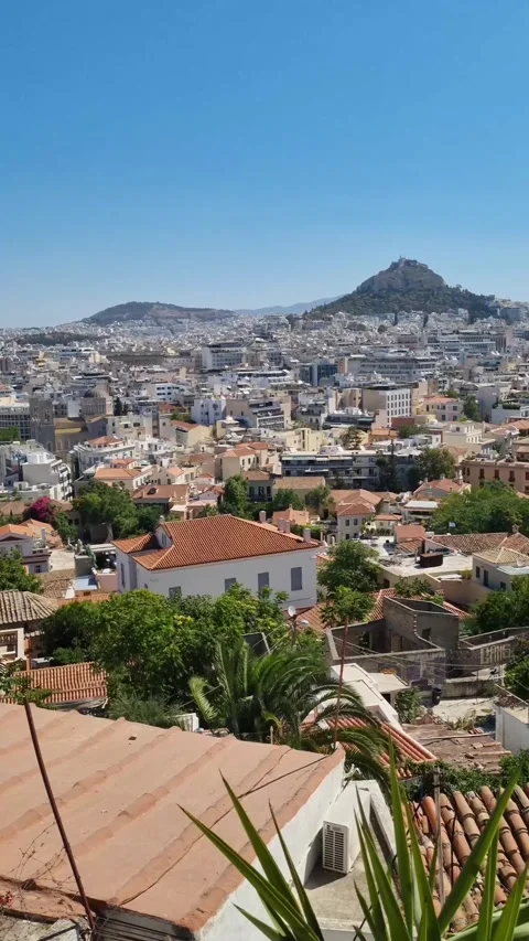 A panoramic view of Athens, Greece, with Mount Lycabettus clearly visible  Video stock 284711490