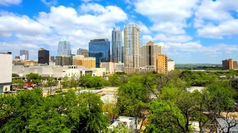 Panoramic View of Austin, Texas City Skyline with Lush Greenery Stock Footage 310650102