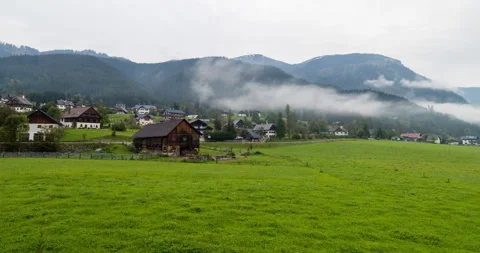 Panoramic view of Austrian valley in 4k. Time lapse of clouds in the summer time Stock Footage 252666943