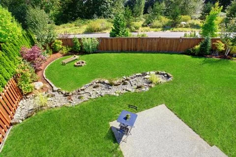 Panoramic view of backyard landscape. Stock Photos