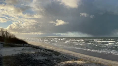Panoramic view of Baltic sea and rainy clouds on sunny winter day Stock Footage 167274004
