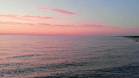 Panoramic view of the Baltic Sea at sunrise or sunset with pastel pink and blue Stock Footage 321755857