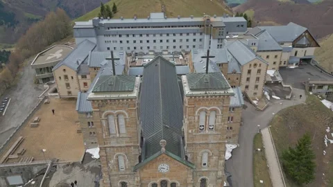 Panoramic view of the Basilica of Our Lady of La Salette in the French Alps Stock Footage 312237011