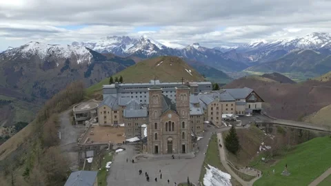 Panoramic view of the Basilica of Our Lady of La Salette in the French Alps Stock Footage 312237137