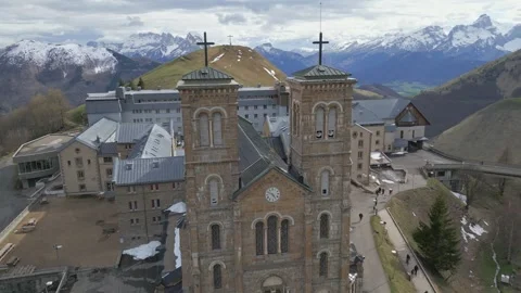 Panoramic view of the Basilica of Our Lady of La Salette in the French Alps Stock Footage 312237275