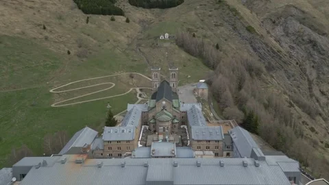 Panoramic view of the Basilica of Our Lady of La Salette in the French Alps Stock Footage 312237748
