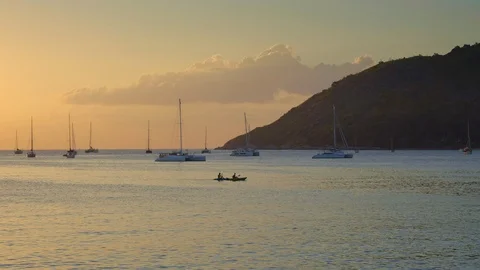 Panoramic view of a bay with many yachts and catamarans in warm sea Stock Footage 114826470