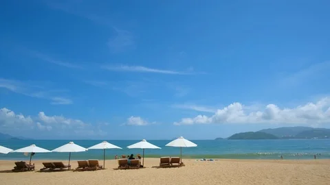Panoramic view beach, chairs and umbrellas Stock Footage 101357707