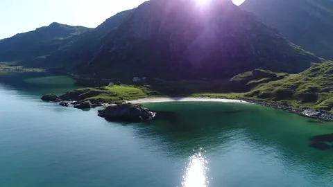Panoramic view of the beach  with rocks  oot of green mountains Stock Footage 136847572