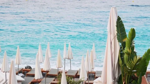 Panoramic view of beautiful beach with turquoise sea, sun umbrellas and beach Stock Footage 202056744
