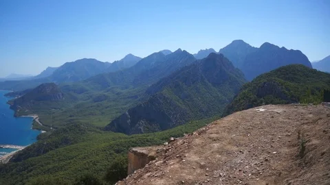 Panoramic view of the beautiful green mountains near the blue sea. Video stock 94589247