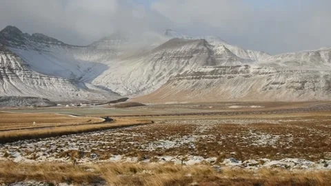 Panoramic view of beautiful snowy mountains in iceland Stock Footage 197457683