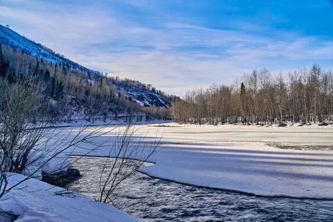 Panoramic view: beautiful spring landscape: the Ulba river in Kazakhstan wake Stock Photos