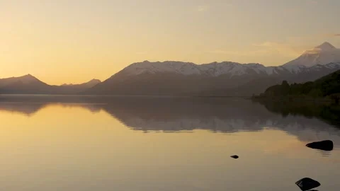 Panoramic view of a beautiful sunset showing Lake Huechulafquen at the foot.. Stock Footage 289862115