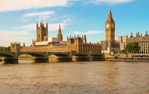 The panoramic view of Big Ben tower and Westminster Bridge in London. Stock Photos