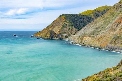 Panoramic view of the Big Creek Bridge along the rugged coast of Big Sur Stock Photos