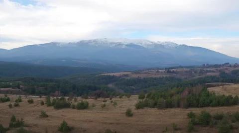 Panoramic view of the big mountain with snowy peak and forest  Aerial flight Stock Footage 58254412