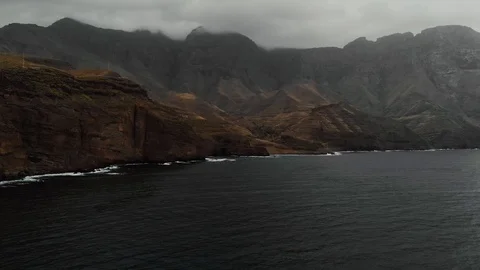 Panoramic view of the big mountains off the coast of the Atlantic Ocean on a Stock Footage 112355207