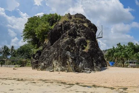 Panoramic view of big stone on beach, indonesia, lombok  Stock Photos