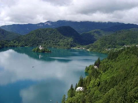 Panoramic view of Bled Lake with Pilgrimage Church of the Assumption of Maria Stock Photos