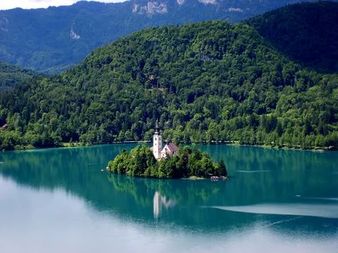 Panoramic view of Bled Lake with Pilgrimage Church of the Assumption of Maria Stock Photos