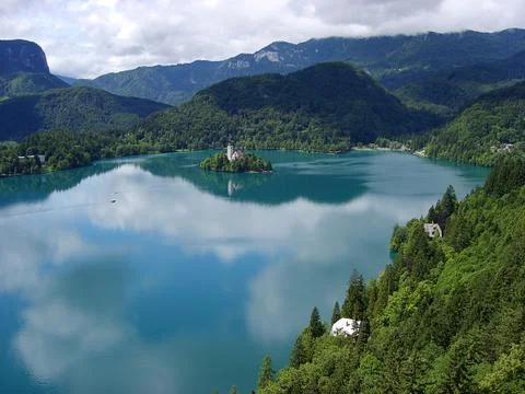 Panoramic view of Bled Lake with Pilgrimage Church of the Assumption of Maria Stock Photos