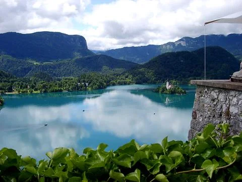 Panoramic view of Bled Lake with Pilgrimage Church of the Assumption of Maria Stock Photos