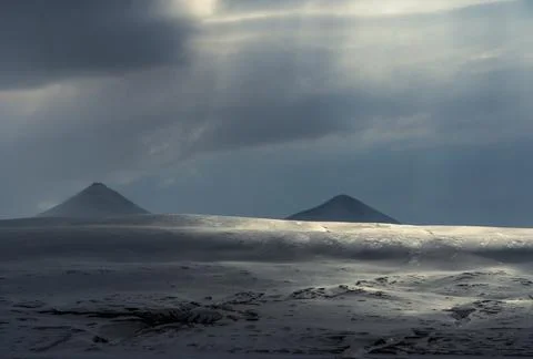 Panoramic view of Blue hour of the mountains, snow and Sea in Svalbard, Norway. Stock Photos