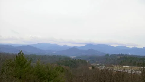 Panoramic view of the Blue Ridge Mountains with a cloudy sky, showcasing the  스톡 동영상 277559460